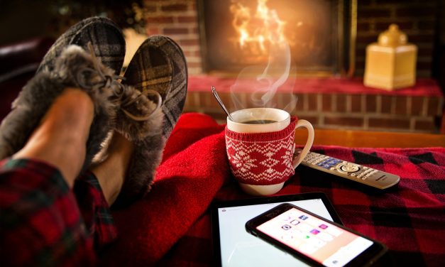 Feet up in front of the fire