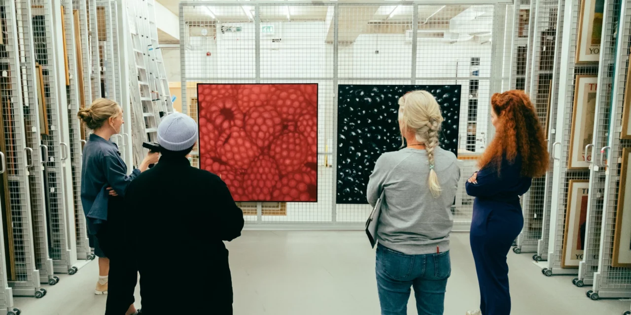 women looking at paintings in an art store