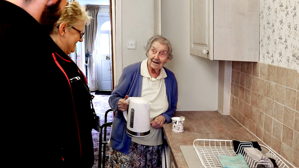 An older lady called Grace receiving support from a support worker