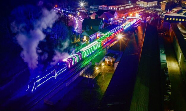 steam train lit with Christmas lights