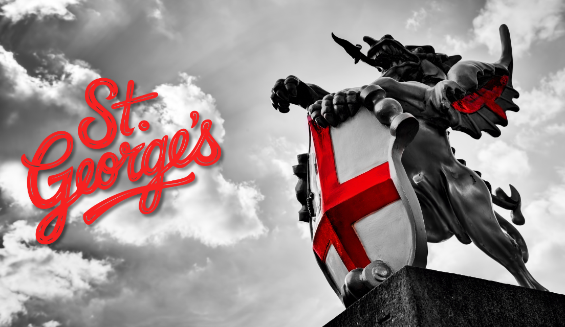 St Georges day East Sussex | A stone dragon sits on a building holding a shield with the Englsih flag on | English culture