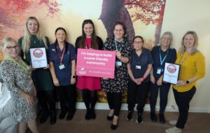 members of JCR team receive their accolade